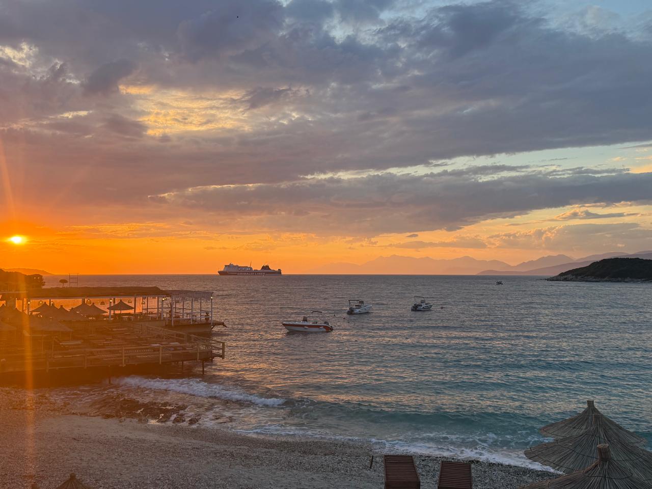 Summer Gate beach restaurant on the Ksamil shore at golden hour