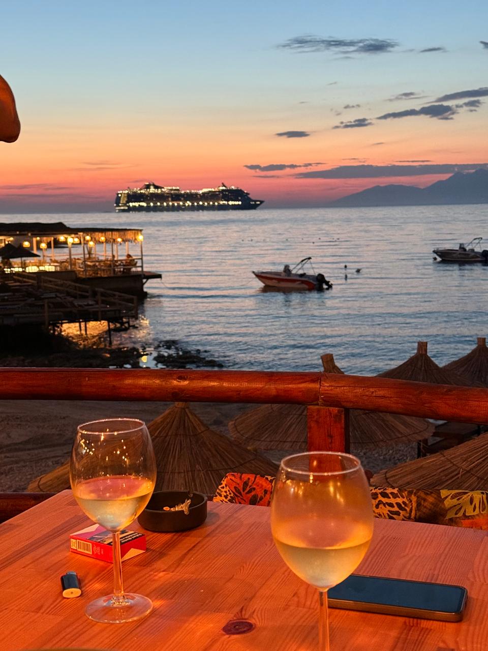 Sunset wine view from Summer Gate terrace in Ksamil